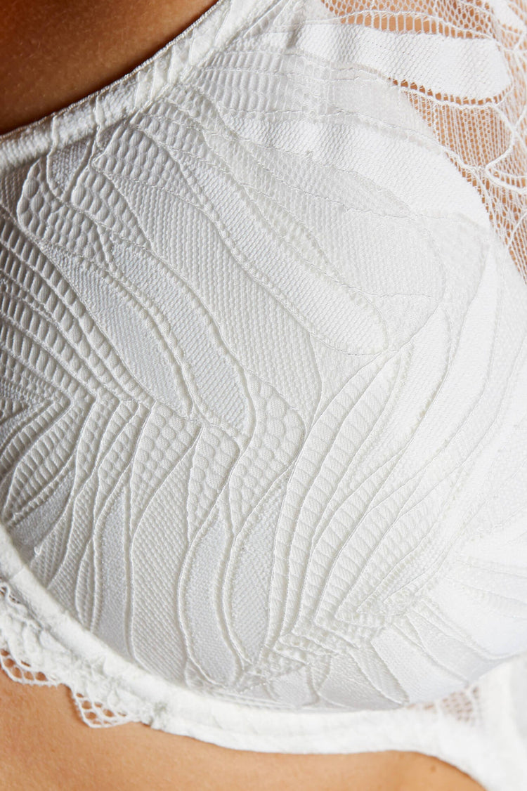 Model in Eclipse Half Padded BH Cream close up