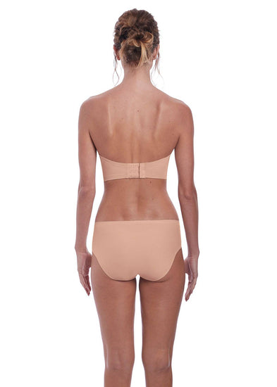 Model in fantasie aura strapless bh natural beige achterzijde